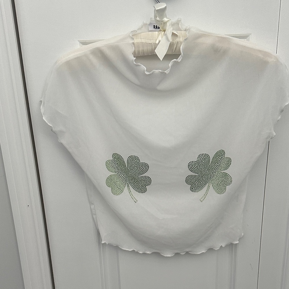 Elegant White Blouse with Green Clover Accents